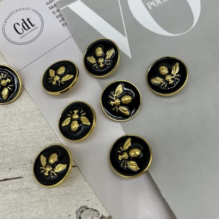 Пуговицы чёрные с золотистой мухой, 23 мм