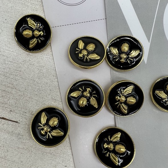 Пуговицы чёрные с золотистой мухой, 23 мм