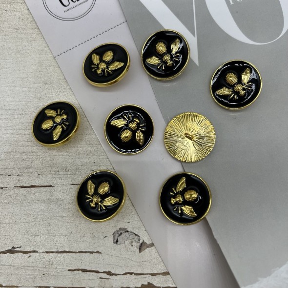 Пуговицы чёрные с золотистой мухой, 23 мм