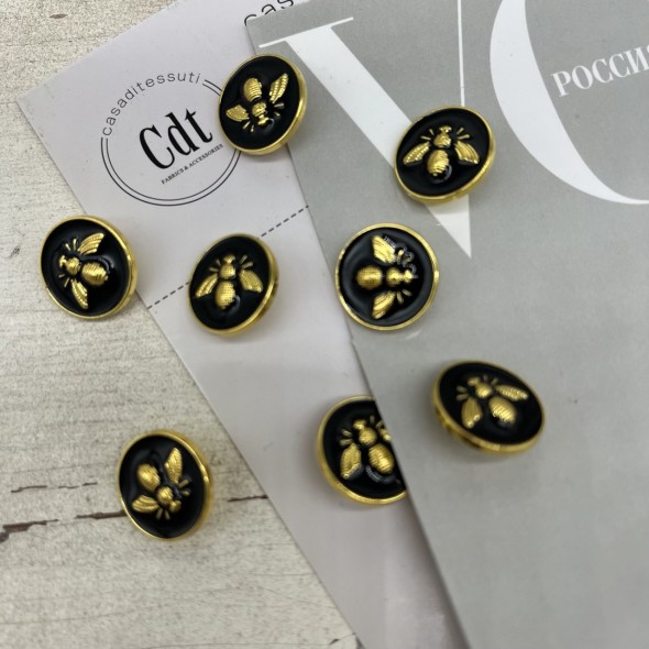 Пуговицы чёрные с золотистой мухой, 18 мм