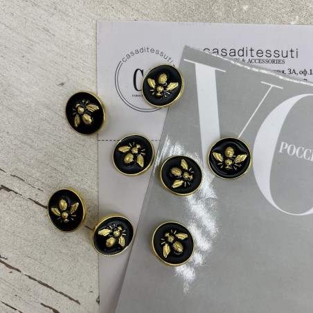 Пуговицы чёрные с золотистой мухой, 18 мм