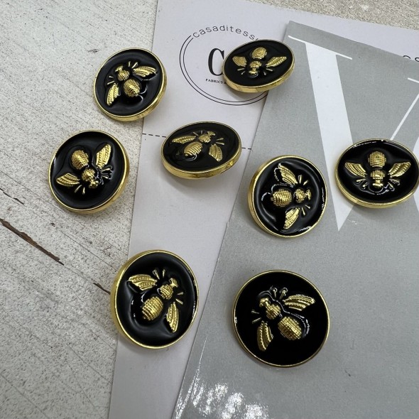 Пуговицы чёрные с золотистой мухой, 18 мм