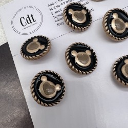 Пуговицы чёрные с матовыми золотистыми медвежатами, 23 мм